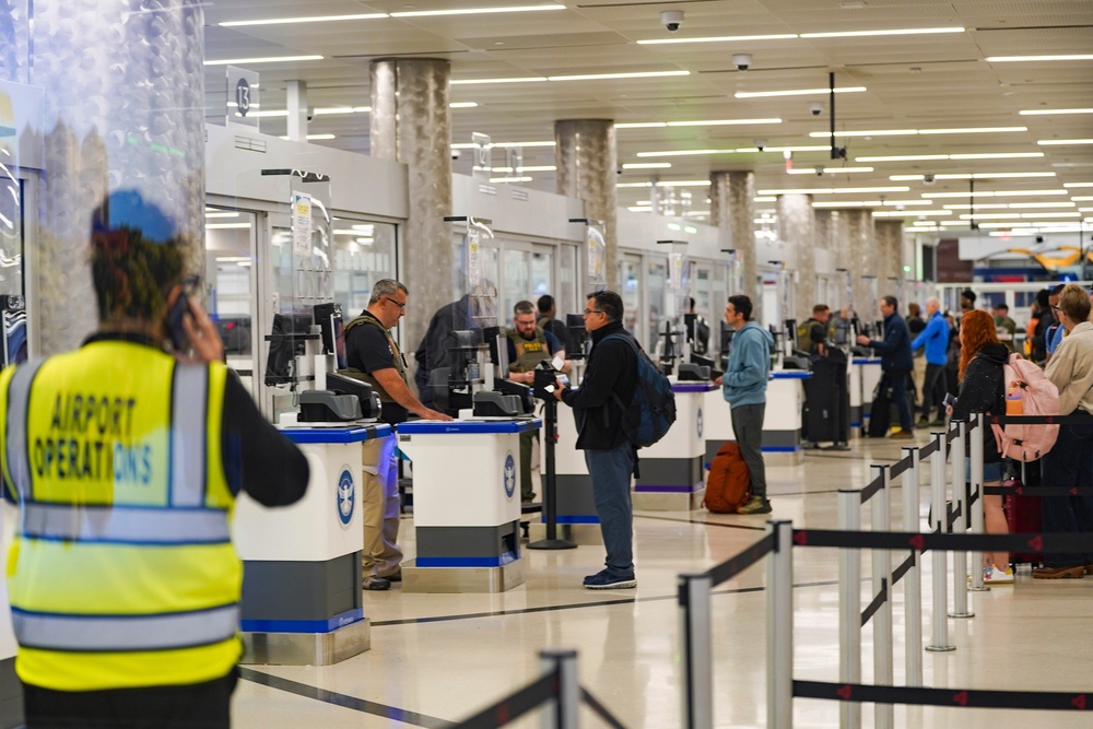 The Trump administration is ‘drawing up’ plans to stop international flights to some Democratic sanctuary cities, which limit cooperation with federal immigration authorities, Markwayne Mullin said (Getty Images)