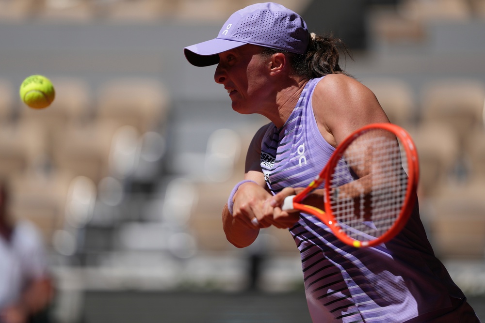 Iga Swiatek hits a backhand (Thibault Camus/AP) (AP)
