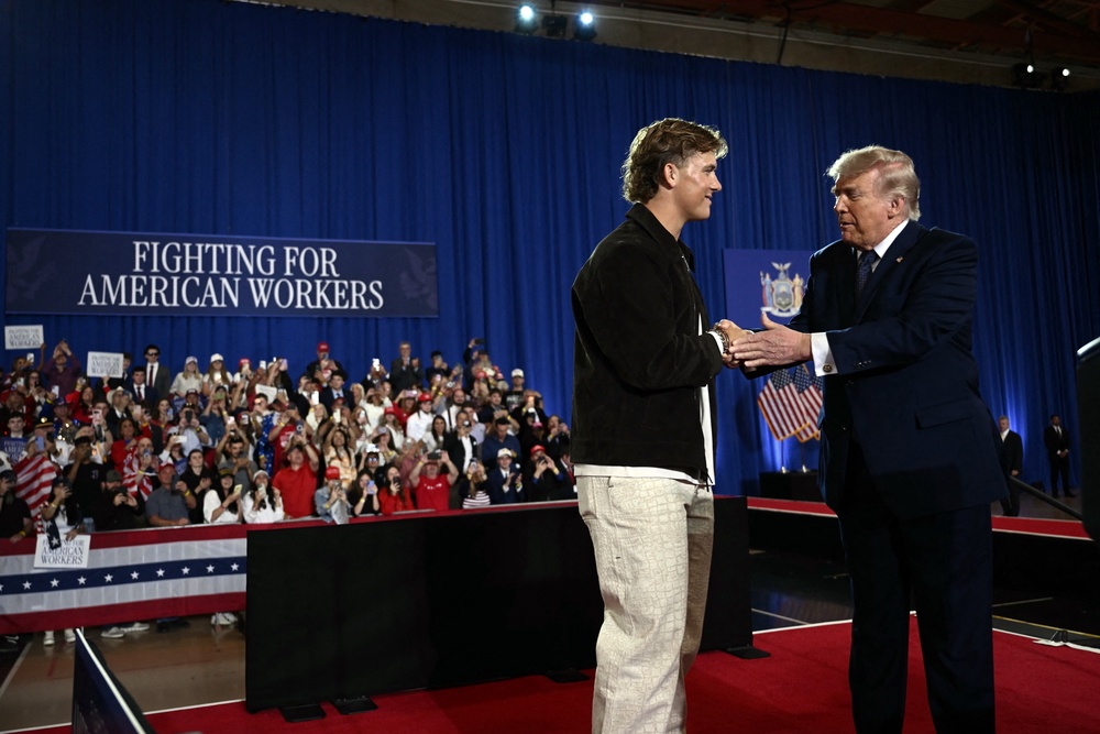 New York Giants quarterback Jaxson Dart introduced President Donald Trump to the stage at a rally in Suffern, New York (AFP/Getty)
