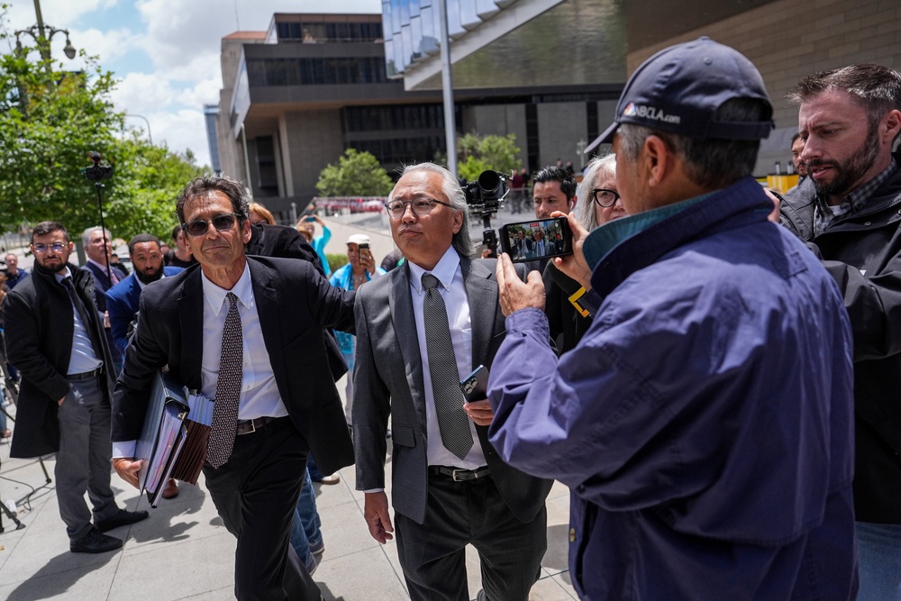 Kenneth Iwamasa, center, one of five people who pleaded guilty in connection with the ketamine overdose death of actor Matthew Perry, and his attorney, Alan Eisner, left, leave federal court after Iwamasa's sentencing in Los Angeles, Wednesday (Copyright 2026 The Associated Press. All rights reserved)