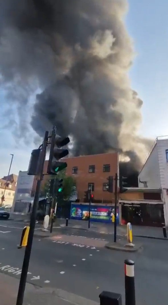 Smoke can be seen rising above the building in Golders Green (Jacobo Bentata)