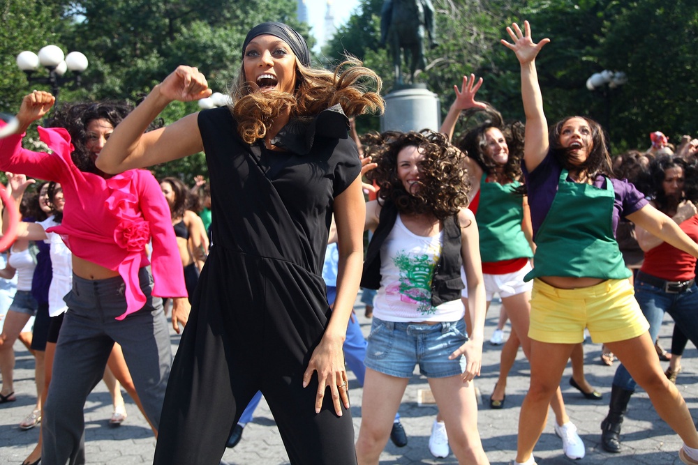 Model Tyra Banks participates in a dance flash mob in New York City’s Union Square on Aug. 17, 2009. One expert said the takeover trend is similar to ‘flash mobs’ from years ago (Getty)