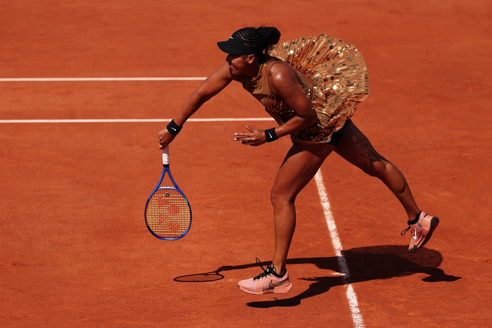 Osaka removed the jacket and train before starting the contest on Court Simonne-Mathieu (Getty)