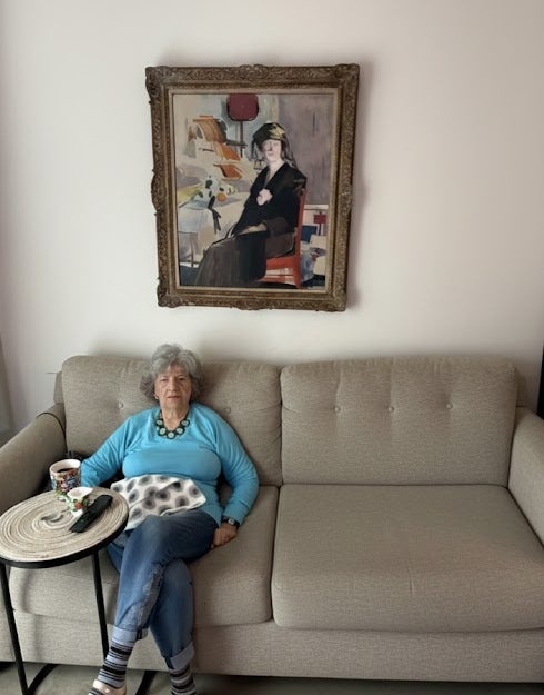 Helene Plotkin with the rediscovered work by FCB Cadell (Plotkin Family/PA)