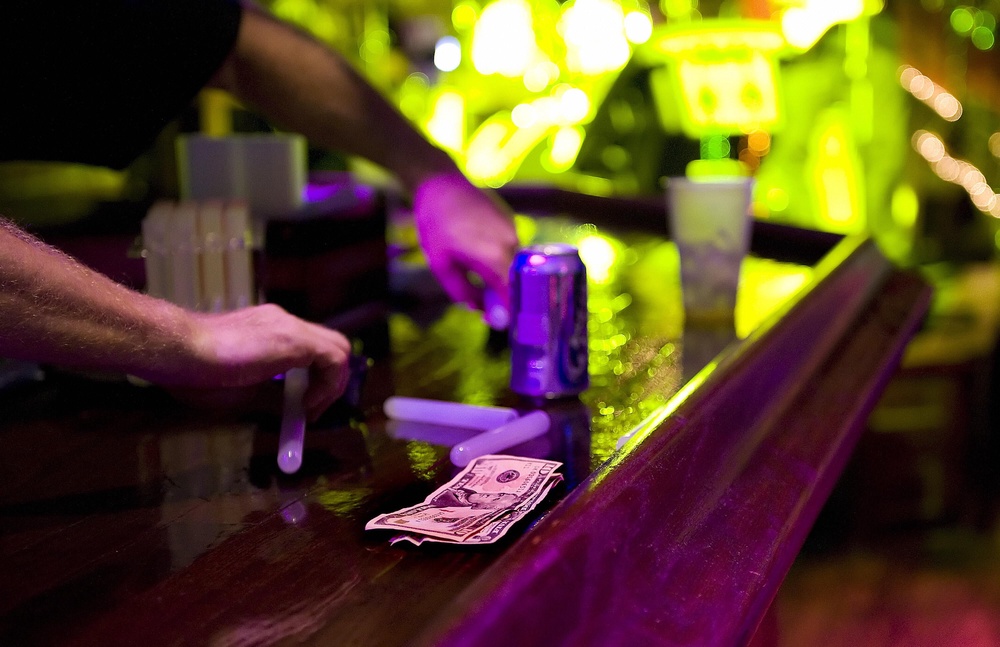 Tipping is, for better or worse, built into the expected compensation of restaurant workers in the U.S. Most American servers and bartenders earn less than the minimum wage and largely rely on tips to make up the difference (AFP via Getty Images)
