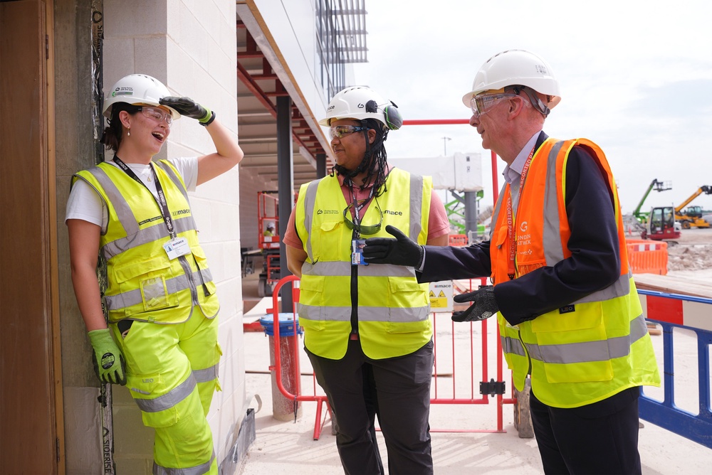 Pat McFadden, right, visited Gatwick Airport to announce expanded support for youth employment schemes (PA)