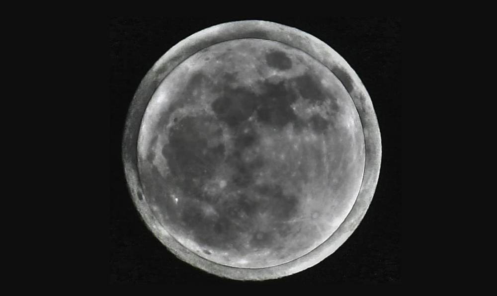 A micromoon overlaid on a supermoon, demonstrating the 14 per cent size difference between the full Moons (Nasa)