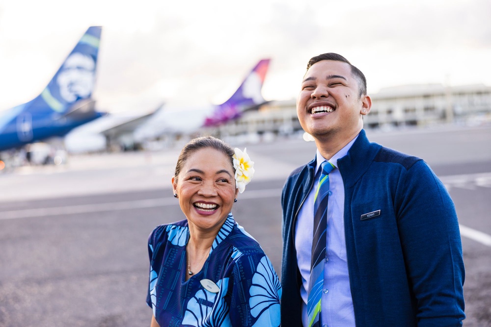 Hawaiian cultural elements such as lei and floral hairpieces remain permitted on any flights traveling directly to or from Hawaii, regardless of the branding on the aircraft (Alaska Airlines / Hawaiian Airlines)