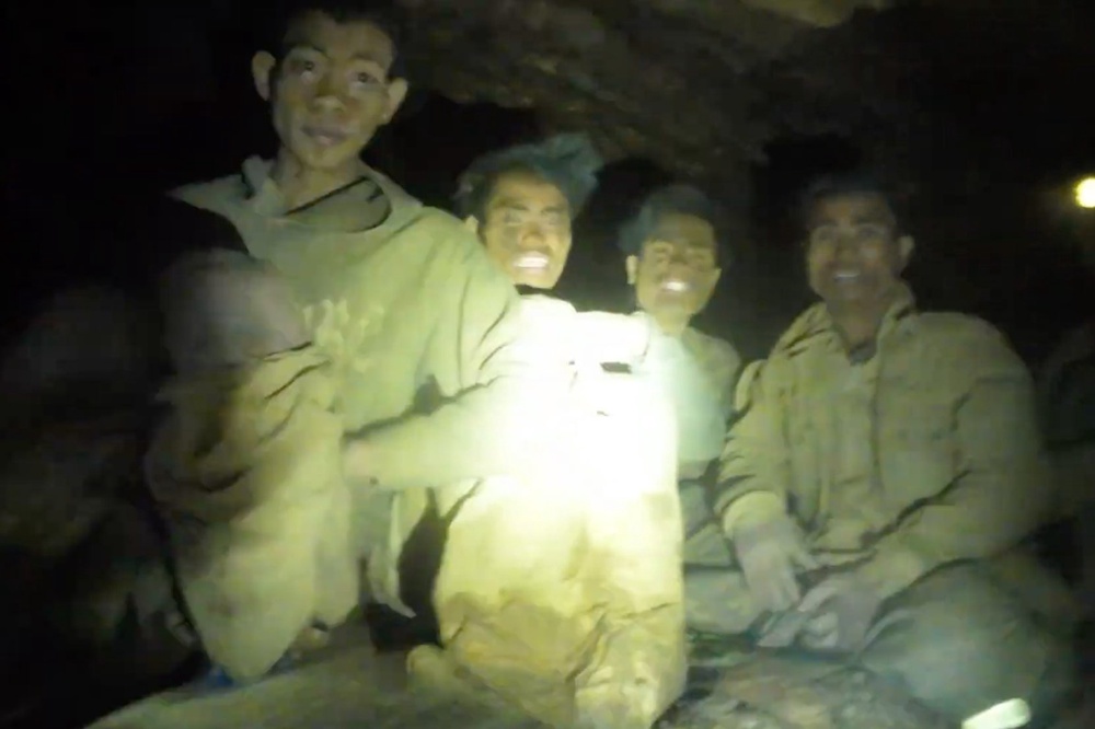 This image made from the video provided by Benz Norrased Palasing Seascout Diving shows the villagers who were trapped and found in a flooded cave in Xaisomboun province, Laos, Wednesday, May 27, 2026 (Benz Norrased Palasing Seascout)