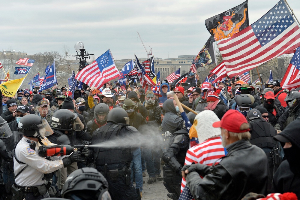 Pro-Trump rioters who attacked the U.S. Capitol on Jan. 6, 2021, could profit from the deal, critics say (AFP/Getty)