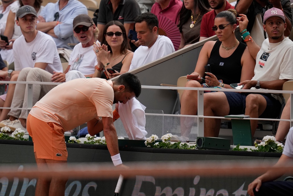 Djokovic appeared exhausted by the fifth set as the match passed the four-hour mark (AP)