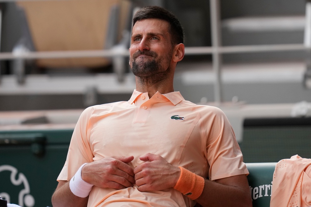 Djokovic pressing into his stomach - is that an issue? (AP)