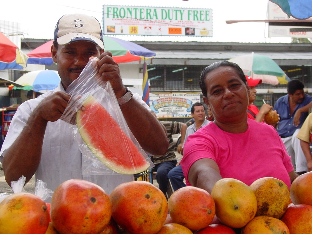 On the border: Vendors in no-man’s land between Panama and Costa Rica (Simon Calder)