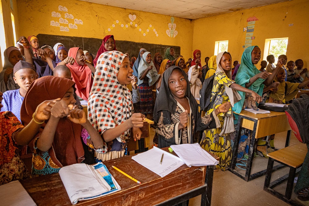 Children in a temporary learning centre in Mubi, Adamawa state do classes so they can rejoin state education (Bel Trew/The Independent)