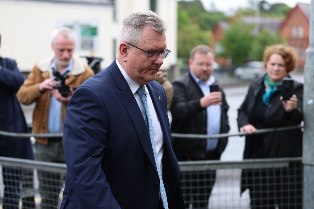The charges against Sir Jeffrey Donaldson, centre, involve two alleged victims (Liam McBurney/PA) (PA Wire)