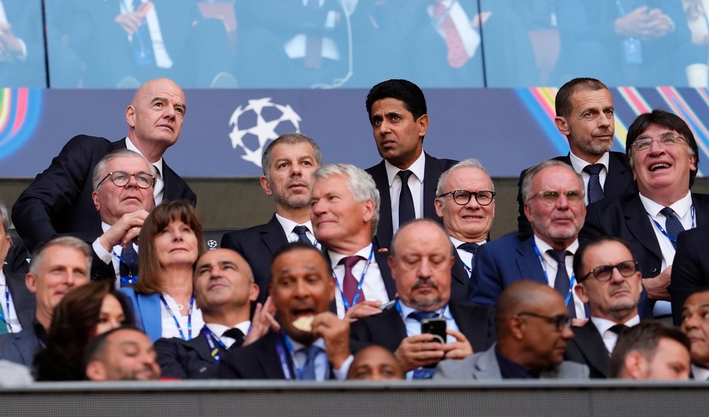 Uefa president Aleksander Ceferin (back right) has been described as in thrall to Khelaifi (PA)