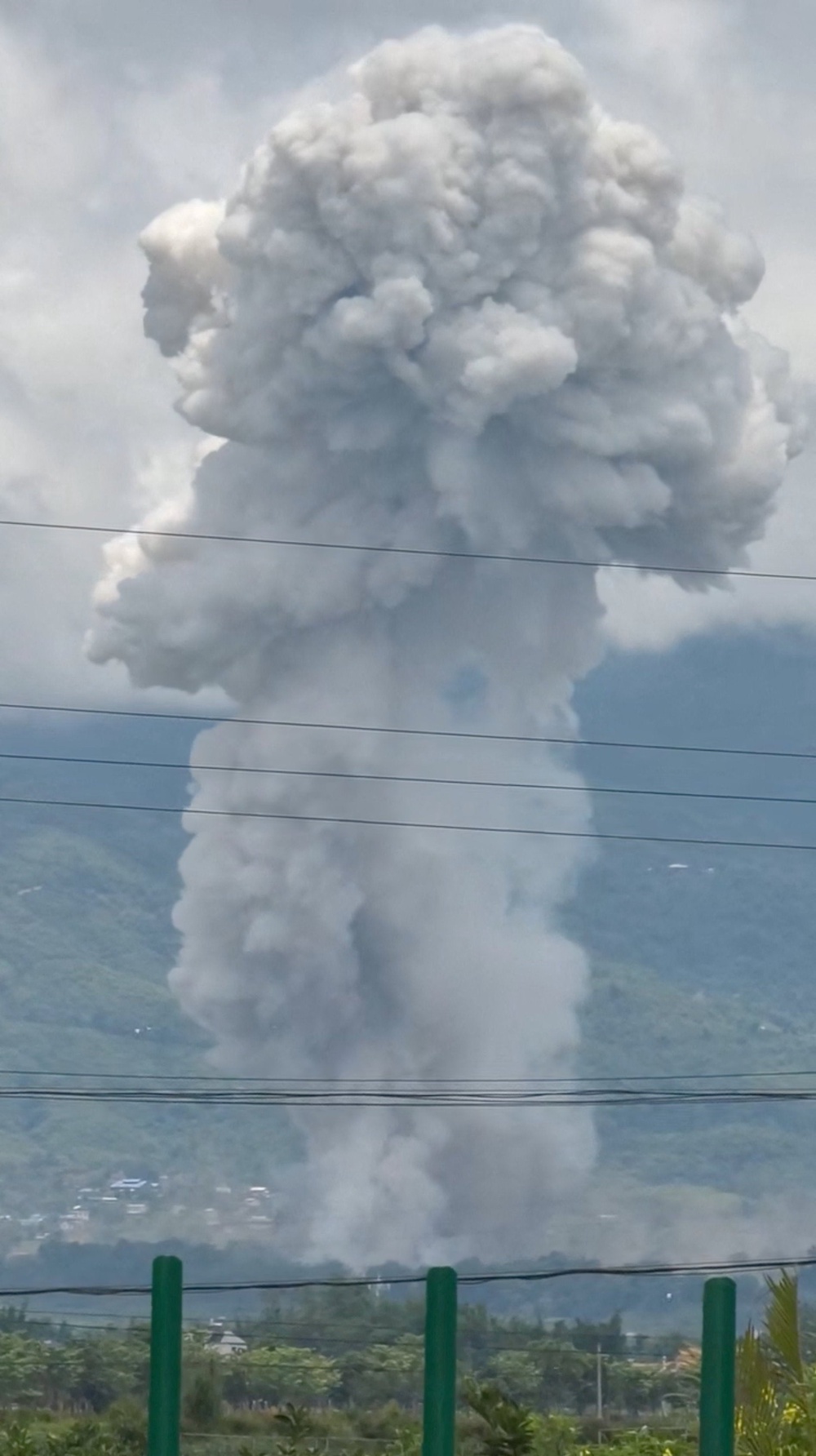 Smoke rises from an explosion in Myanmar as seen from Ruili, Yunnan Province, China (Reuters)