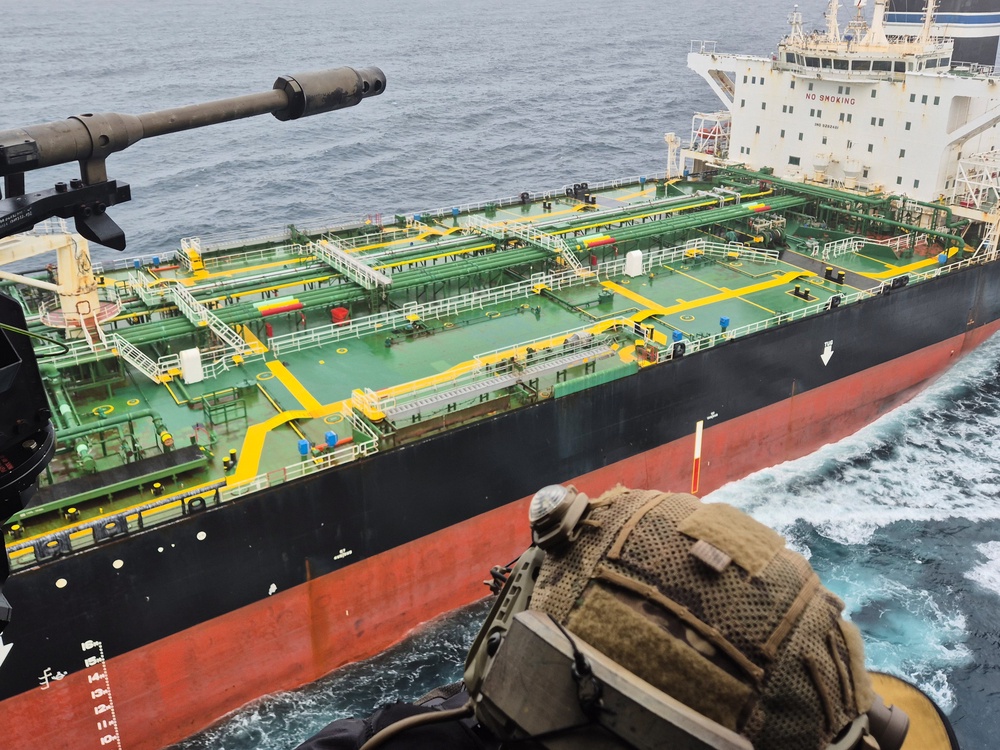 A French army helicopter flies over the sanctioned Tagor in the Atlantic, on 31 May (AP)