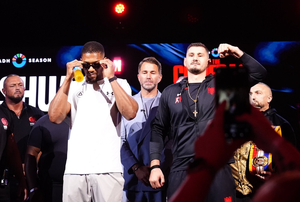 Anthony Joshua, left, and Kristian Prenga faced off in London (John Walton/PA) (PA Wire)