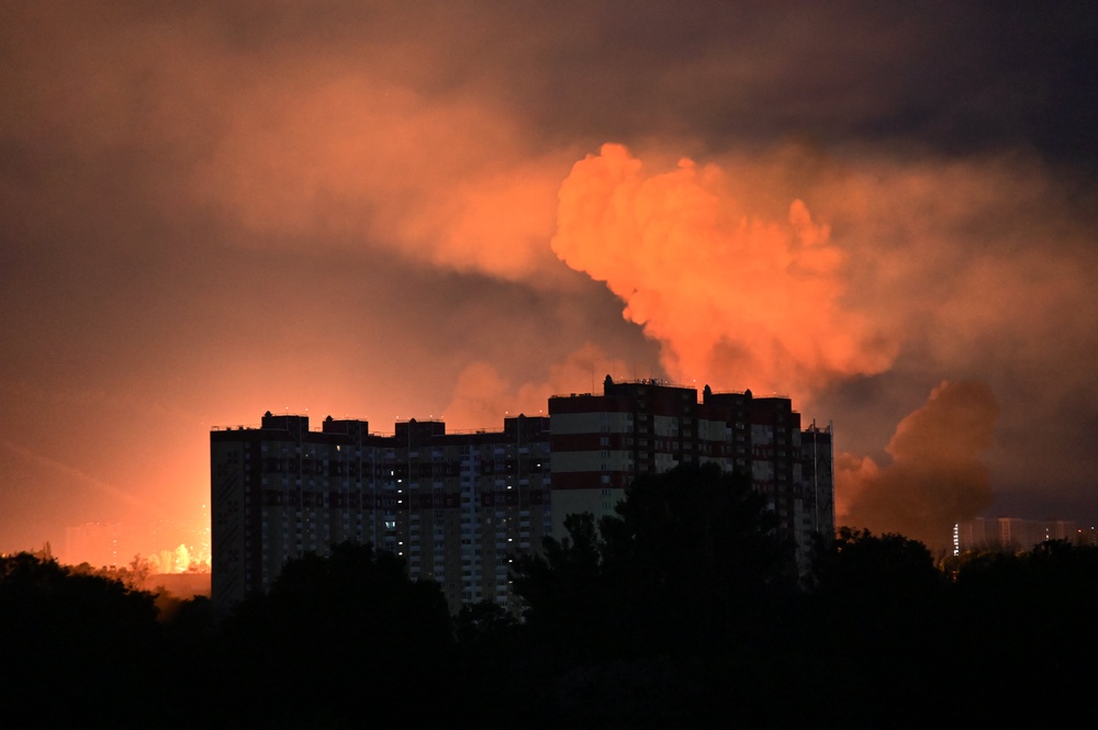 Explosion seen during overnight drone and missile attacks in Kyiv (AFP/Getty)
