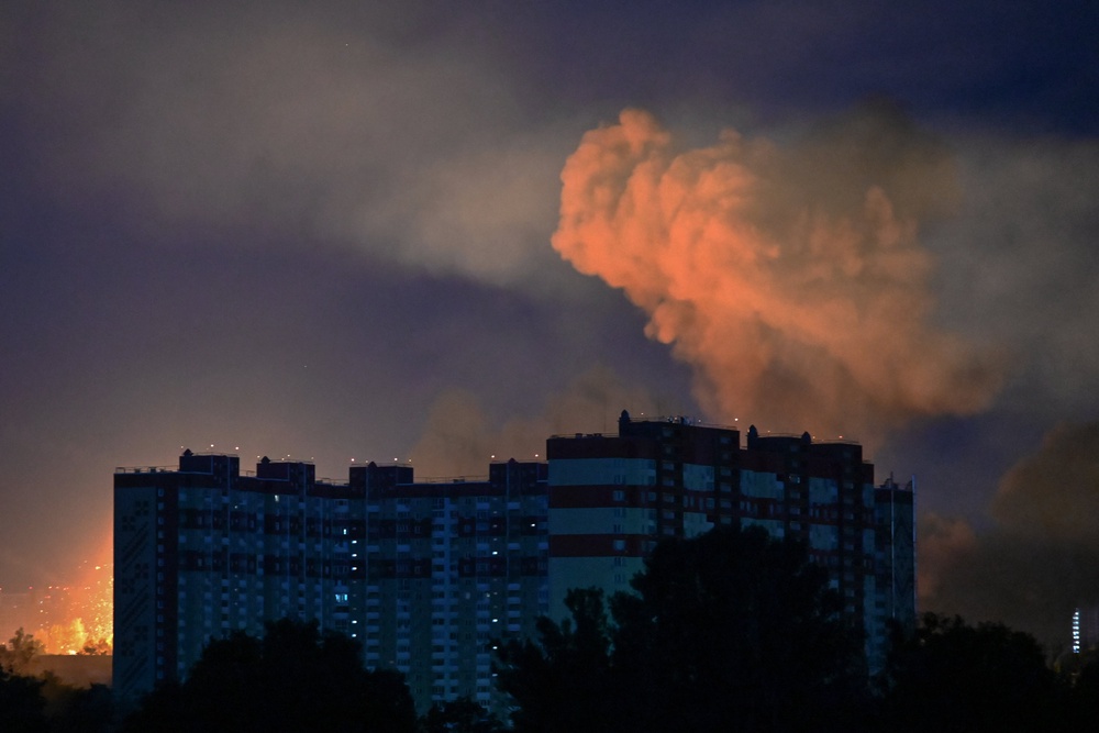 Huge cloud of smoke rises after an explosion from drone and missile attacks in Kyiv (AFP/Getty)