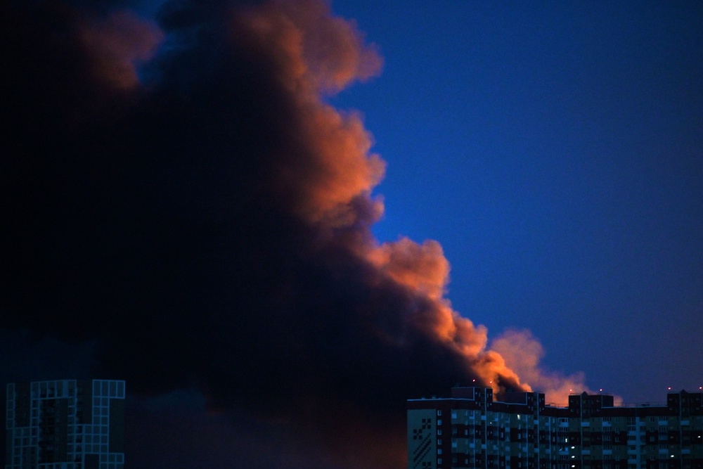Smoke seen rising from a building following Russian missile strikes in Kyiv (AFP/Getty)