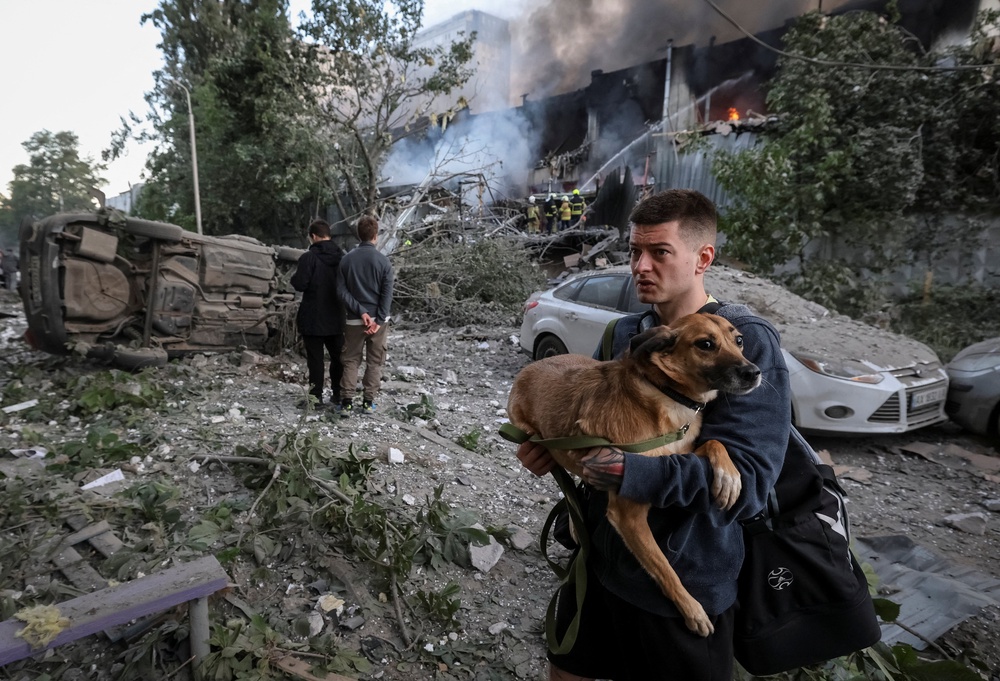 Russia said the war was entering ‘a new paradigm’ following the widespread attacks (pictured: Kyiv on Tuesday) (Reuters)