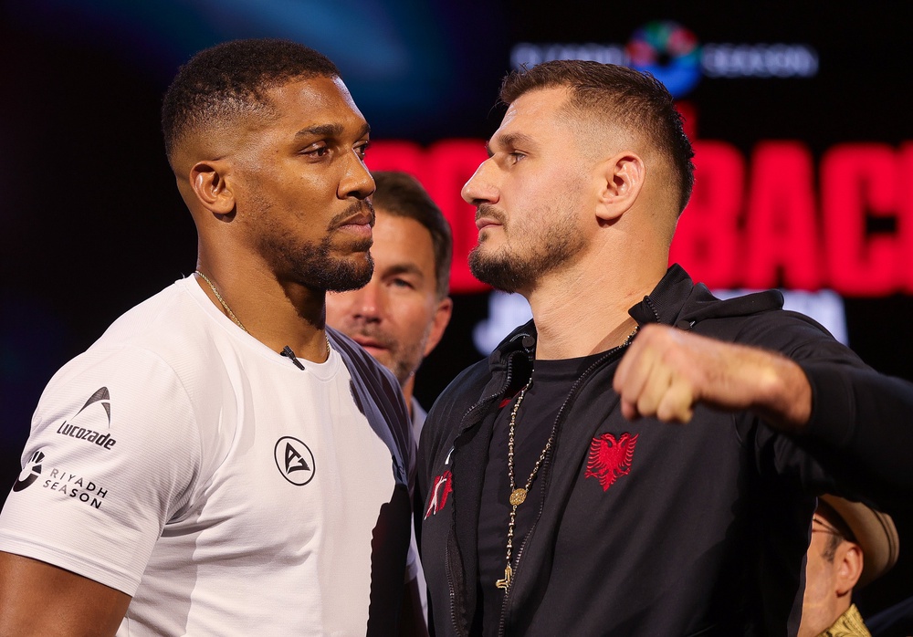 Joshua facing off with his next opponent, Kristian Prenga (Getty)