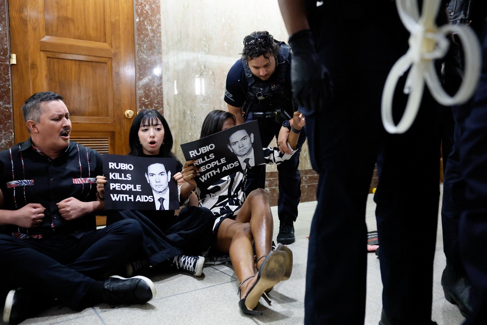 Protesters gathered on Capitol Hill ahead of Secretary of State Marco Rubio's testimony today (REUTERS)