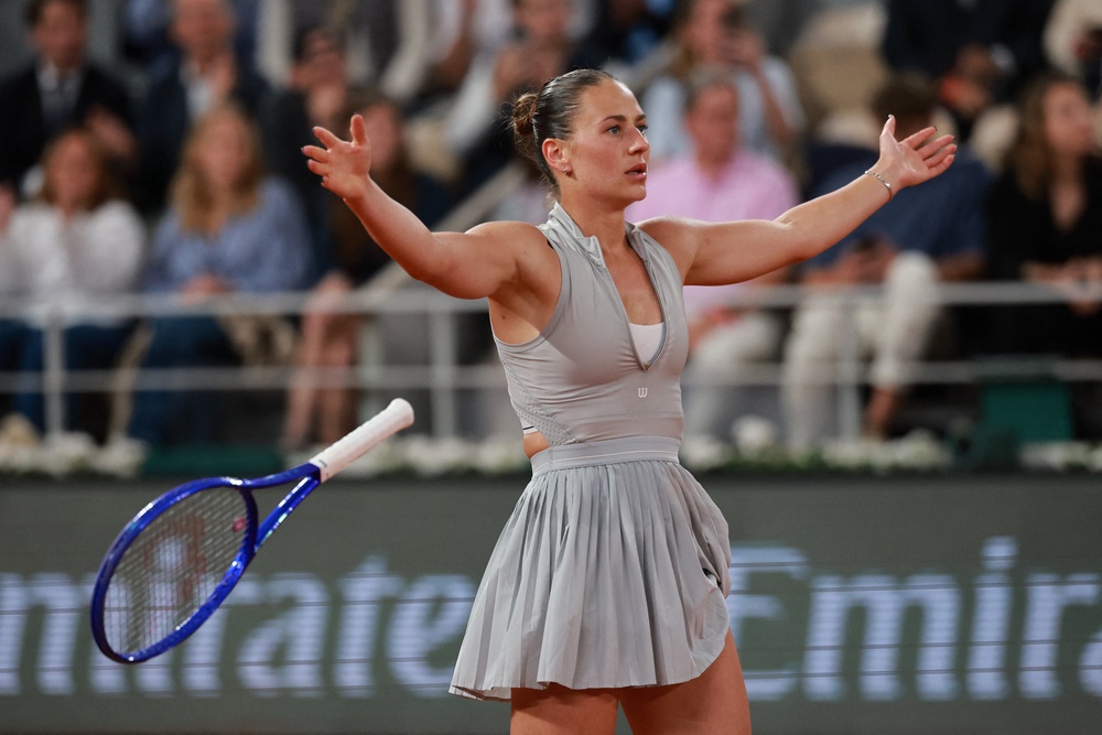 Marta Kostyuk celebrates her 6-3 2-6 6-2 victory over Elina Svitolina (Reuters)