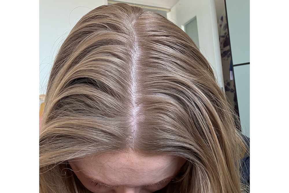 After applying a hefty dose of the gold lust formula (in excess of 10 spritzes), my roots continued looking stringy (Lucy Smith/The Independent)