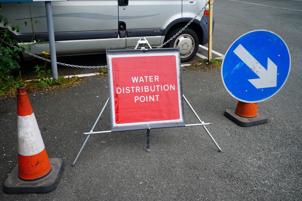 A sign advertising water distribution at Freshwater car park in Brixham (PA) (PA Archive)