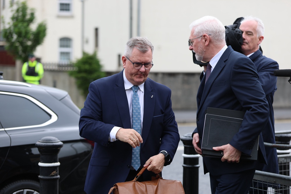 Sir Jeffrey Donaldson with his solicitor John McBurney (Liam McBurney/PA) (PA Wire)