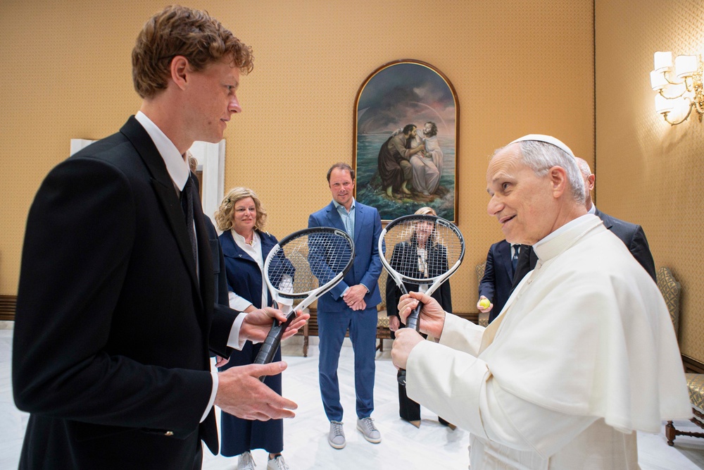 Italy's Jannik Sinner, left, shares a light moment with Pope Leo XIV on the occasion of their meeting at the Vatican, May 14, 2025 (Vatican Media via AP)