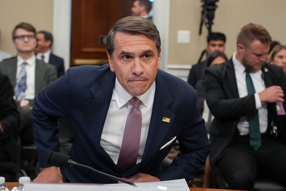 Acting Attorney General Todd Blanche has defended the settlement deal while disputing that the president is receiving ‘blanket immunity’ from investigations into alleged tax crimes (Getty Images)