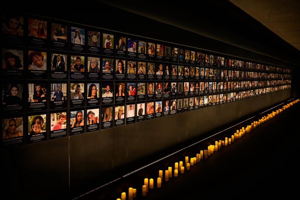 A gallery of images showing those killed in the attack is displayed at the Nova Exhibition (Getty)