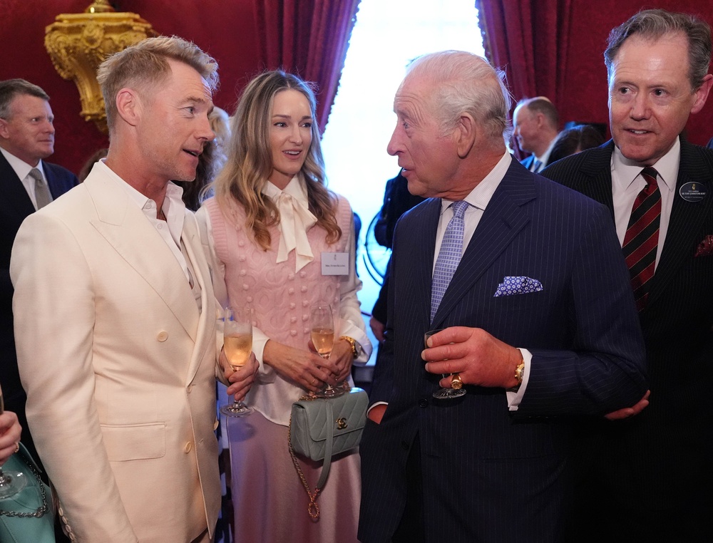 Charles with Ronan Keating and his wife Storm (Jonathan Brady/PA) (PA Wire)