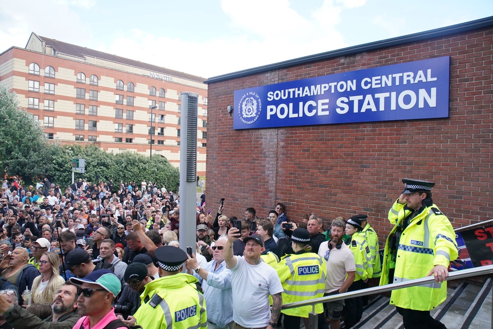 People gathered outside Southampton police station (Gareth Fuller/PA) (PA Wire)