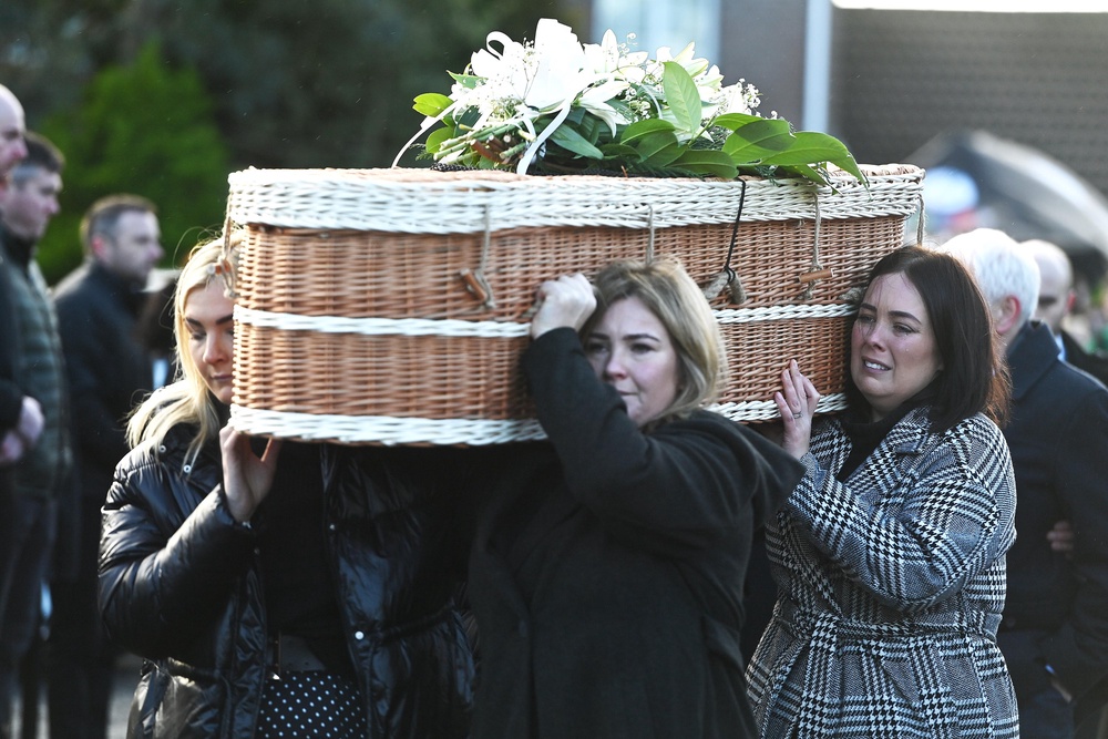 Friends carried Natalie McNally’s casket at her funeral in December 2022 (Oliver McVeigh/PA) (PA Archive)