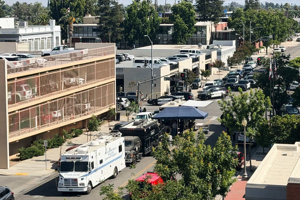 An overhead view shows the scene of a standoff after a man barricaded himself inside a bank (AP)