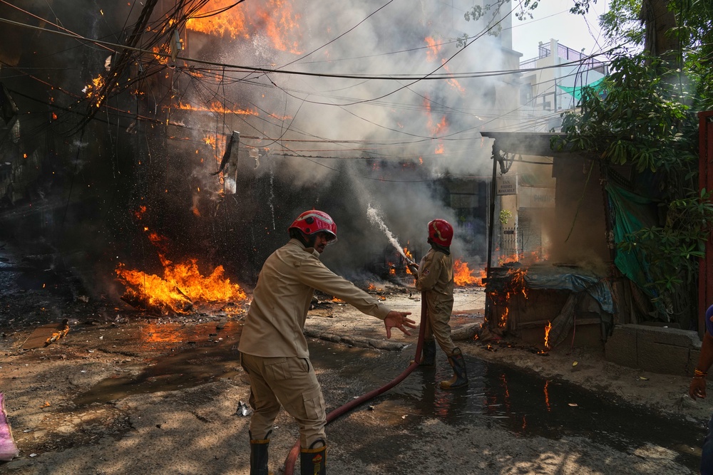 Photos show a rescue operation in a New Delhi hotel fire (Copyright 2026 The Associated Press. All rights reserved.)