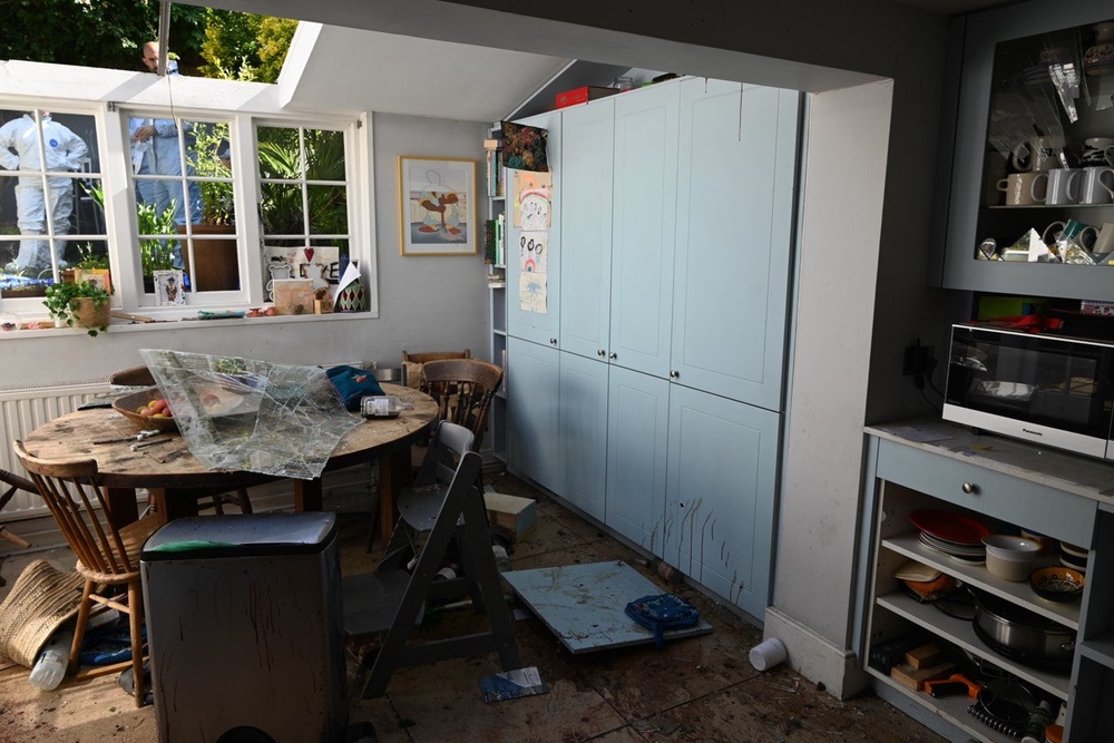 In the aftermath of the killing, George started a fire in the basement in order to cause a gas canister explosion which ripped through the house (PA)