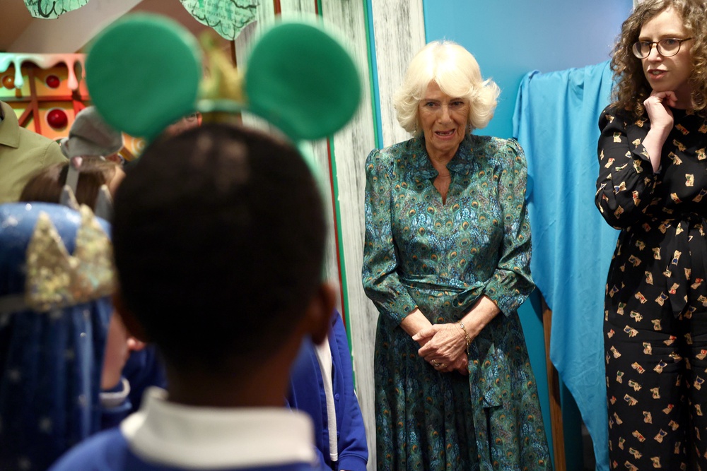 Camilla met children taking part in a fairy-tale character activity during her visit (Henry Nicholls/PA) (PA Wire)