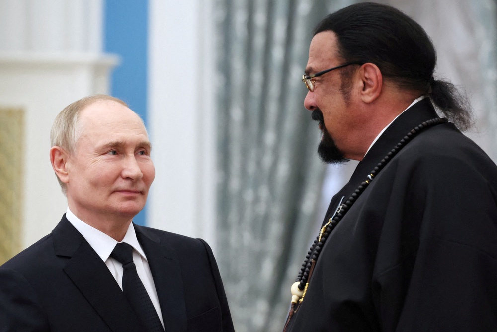Russian President Vladimir Putin and Russian Foreign Ministry's special representative for Russian-American humanitarian relations, actor and producer Steven Seagal (Reuters)