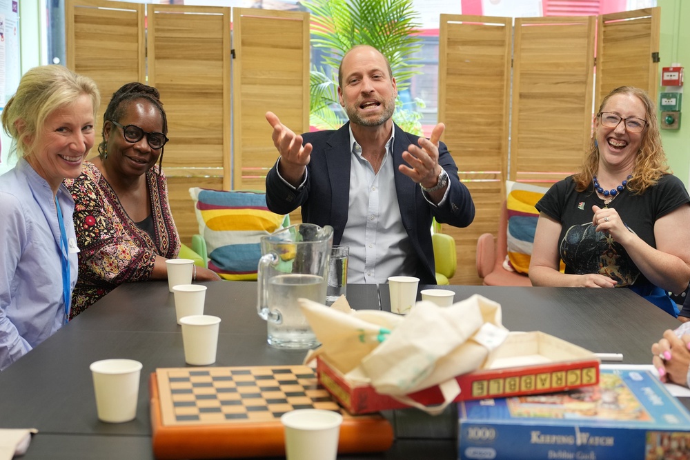 At charity Pecan’s base, William chatted to staff (Kin Cheung/PA) (PA Wire)