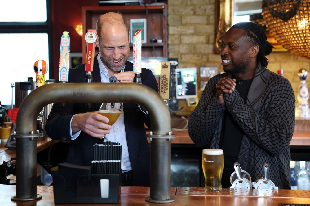 William poured a pint and then compared it to pub founder Clement Ogbonnaya’s effort (Chris Jackson/PA) (PA Wire)