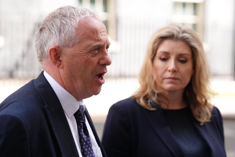 Lord Mann (left) and Penny Mordaunt (right) has previously cautioned about a rise of antisemitism (PA)
