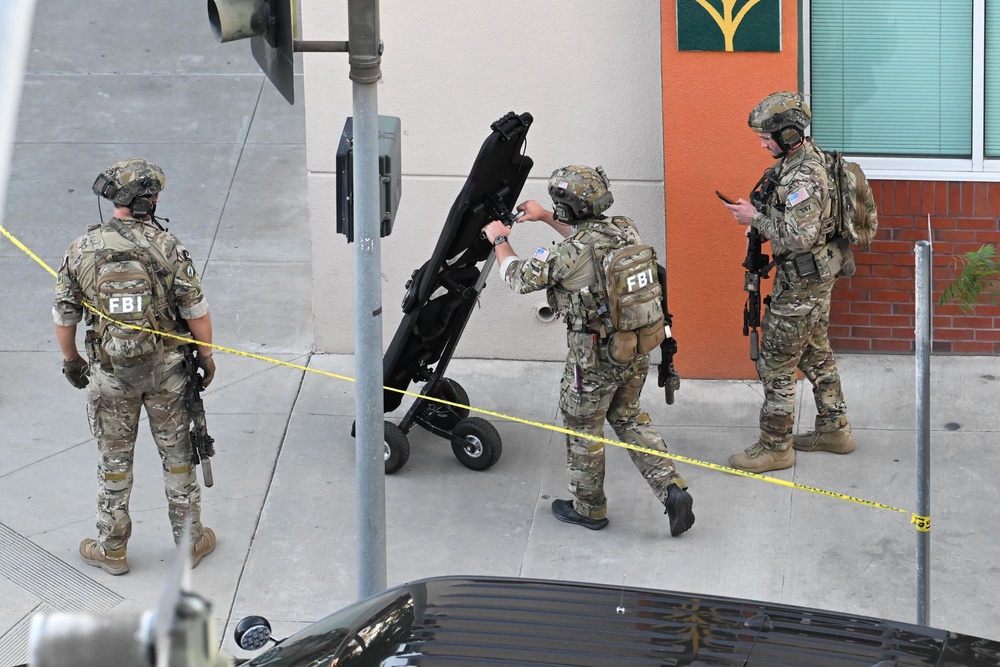 The hostage-taking prompted a large-scale police response (AP Photo/David Dennis)