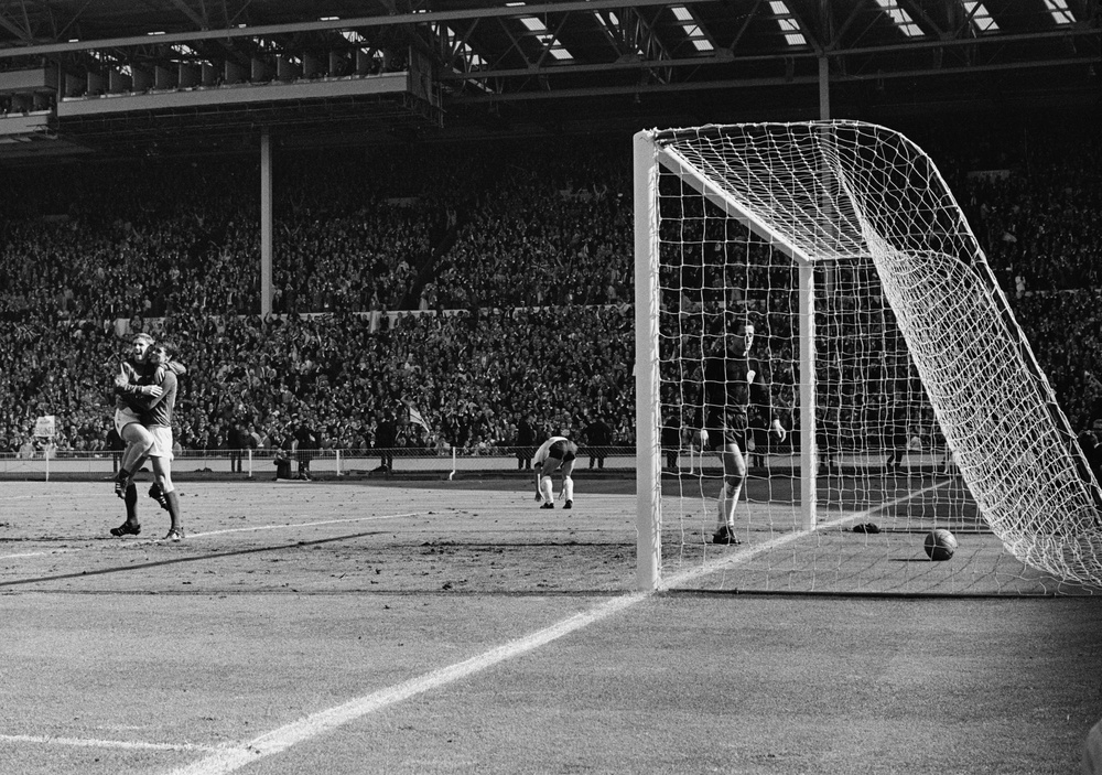 Hurst and Alan Ball celebrate England’s fourth (Getty Images)