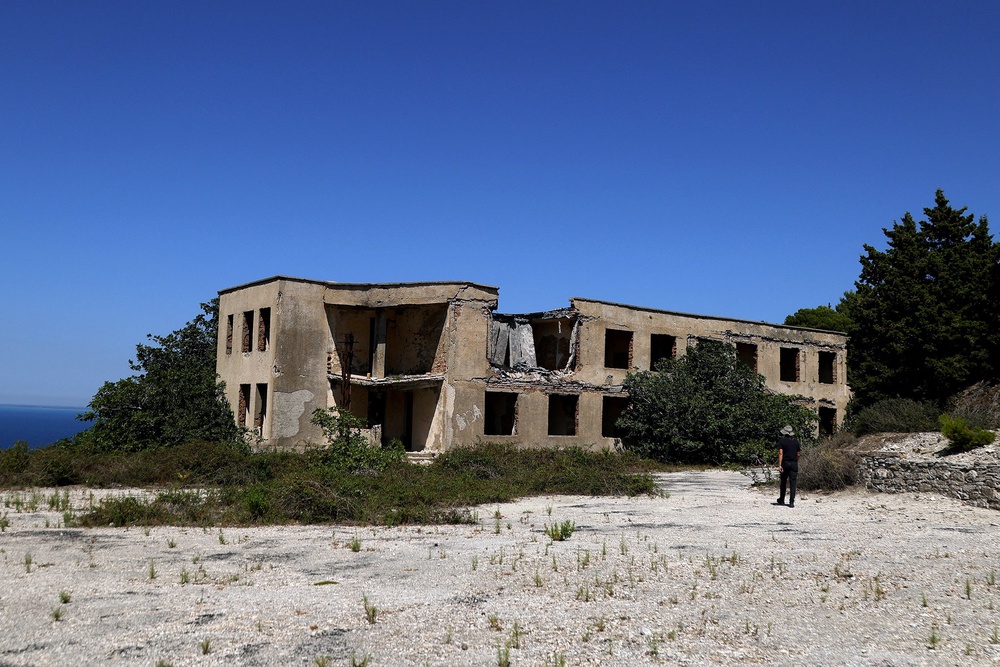 An abandoned ex-military command building on a hilltop on the island of Sazan (AFP/Getty)